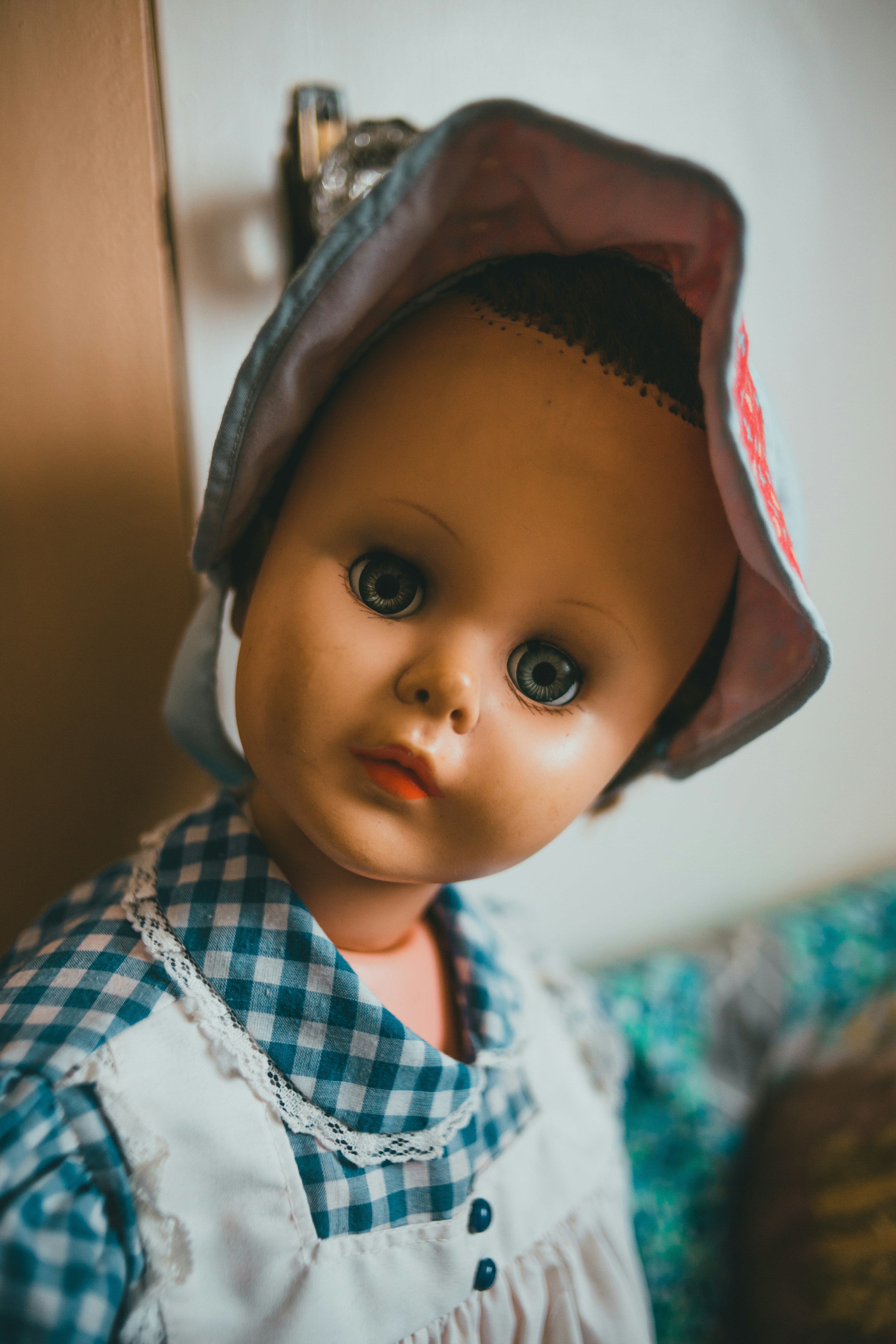 baby in blue and white polka dot hoodie